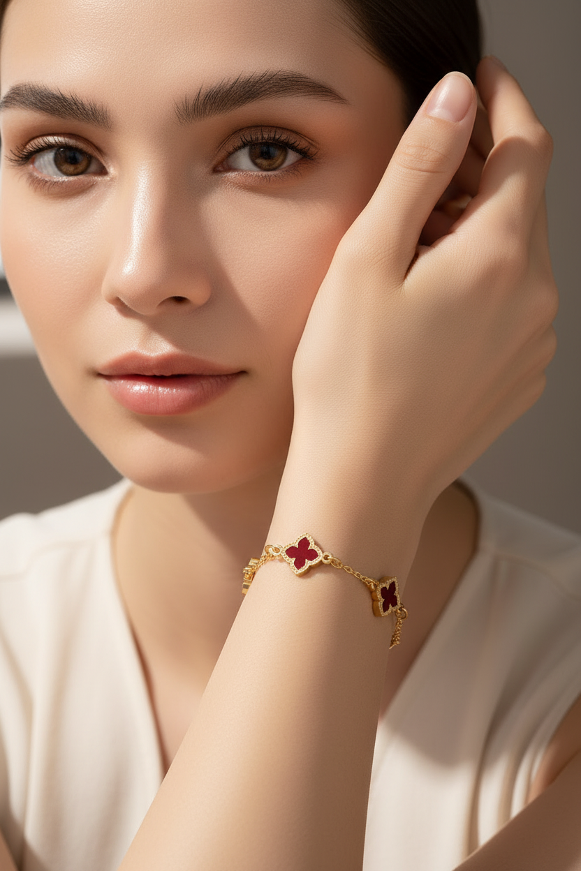 Woman model with face wearing red clover bracelet