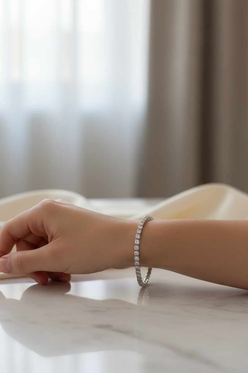 Woman wearing The Standard bracelet with refined stones